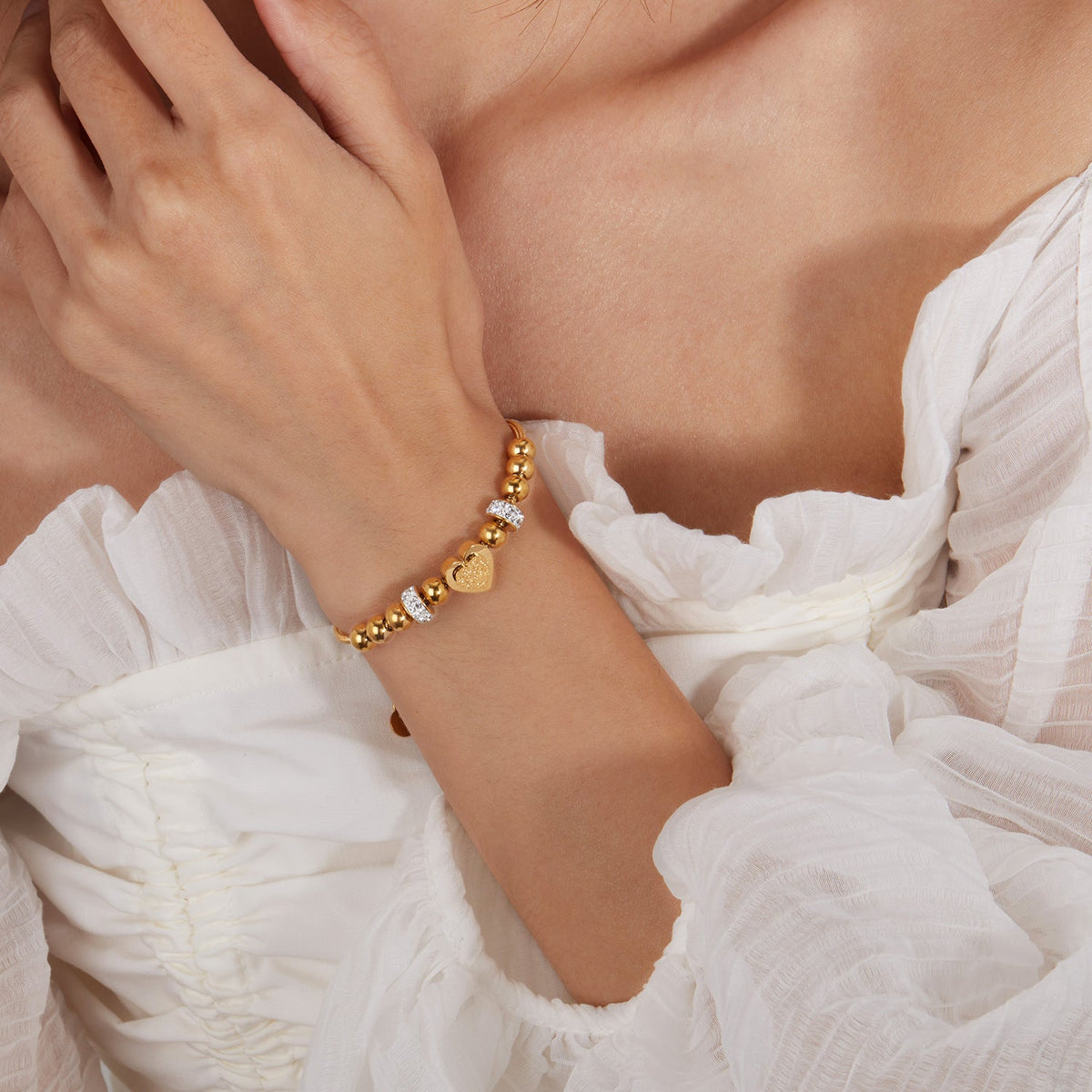 Gold-Tone Heart Chain Bracelet with Crystal Accents